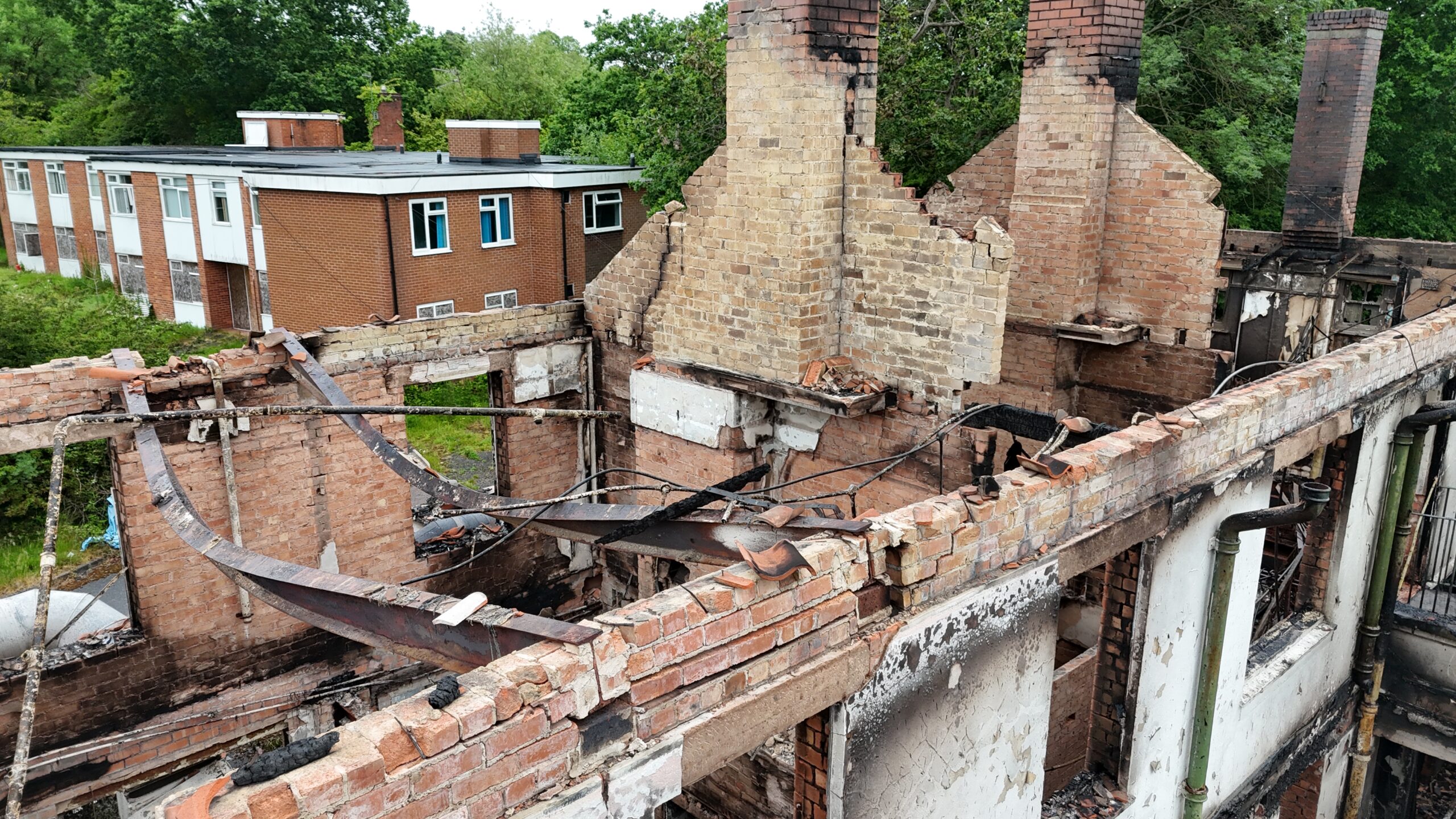 Drone survey showing extensive roof and building damage